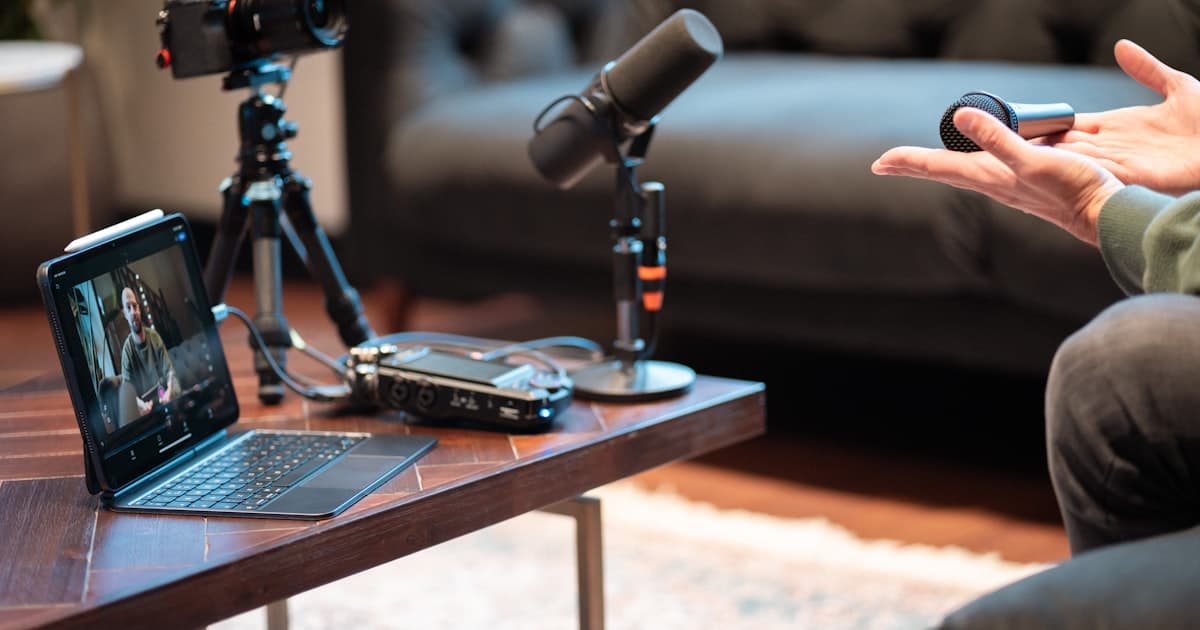 Professional audio recording setup with microphone and monitoring equipment.