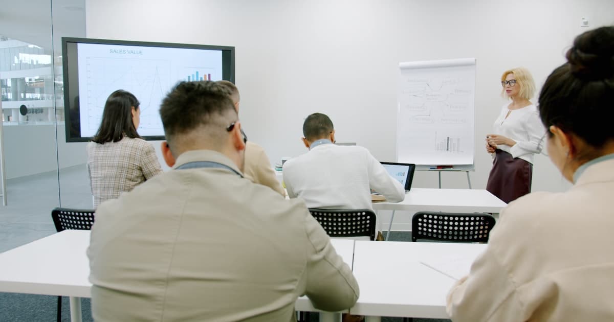 Business team in a modern conference room during a strategy presentation.